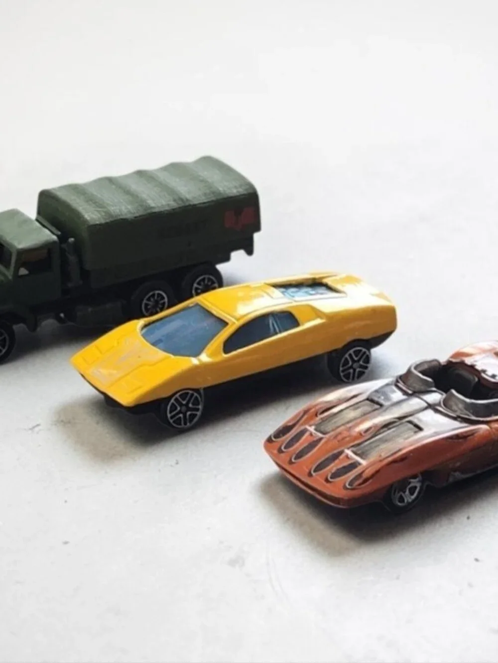 (Lot Of 3) Assorted Corvette Stingray /Datsun 126X/ Military Truck Die-Cast 1:64